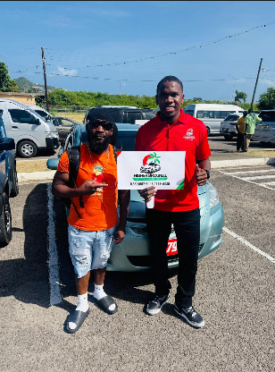 HG Car Rental team member handing over keys to a customer